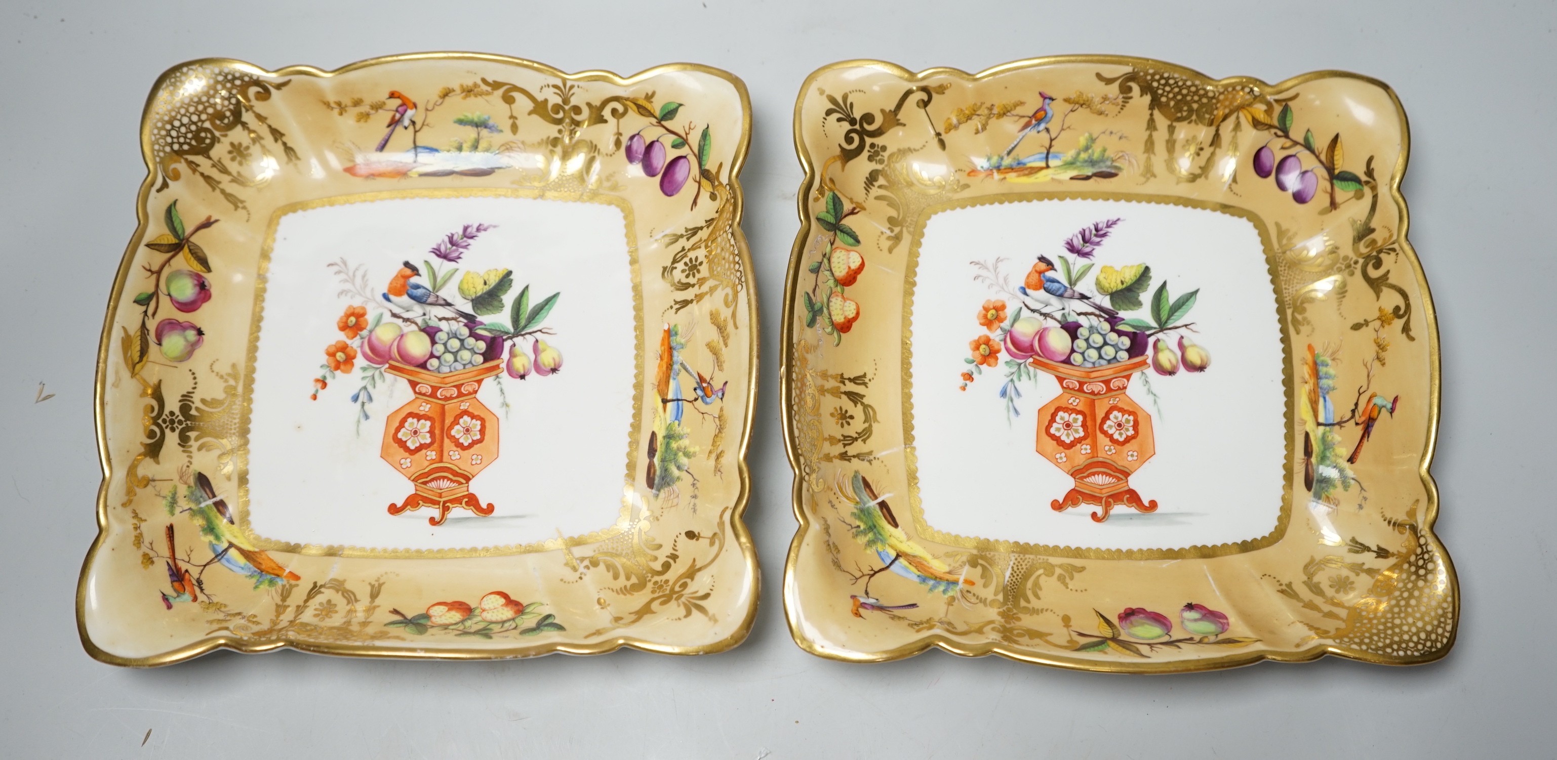 A fine pair of Coalport bird and fruit painted dessert dishes, c.1825, 20.5cm